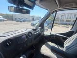 a view of the inside of a vehicle from the driver ' s seat
