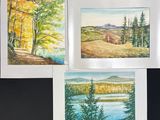 trois aquarelles représentant des arbres et un lac sur fond noir