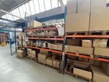 many boxes and boxes on the shelves in the warehouse