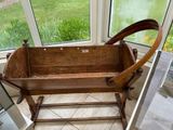an old wooden bath tub sitting in the corner of a room