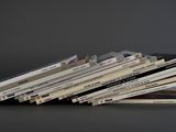 a stack of cds stacked on top of each other