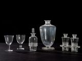 a lot of glass items that are on a table