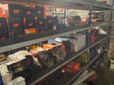 many tools on the shelves in the garage