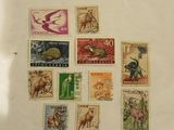 a picture of a collection of stamps on a table