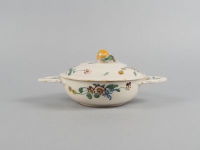 an image of a bowl with a lid and flowers on it