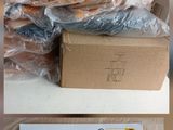 several pictures of a box of assorted items sitting on top of a table
