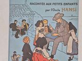 a book with a picture of people sitting on a bench