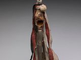 an image of a statue of a woman holding a child