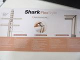 a picture of a box with a picture of a shark flex style
