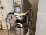 an image of a mixer in a kitchen with tile flooring