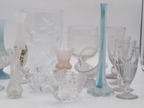 a lot of glass items sitting on a table