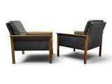 pair of danish lounge chairs in black leather and teak, 1960s