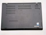 a black laptop that is sitting on a white table