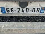 a close up of a license plate on the back of a car
