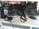 a lot of electronics that are on a shelf