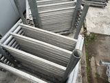 many pieces of metal that are stacked on top of each other