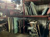 a room filled with lots of different types of furniture