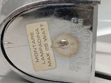 a close up of a toaster with a tag on it