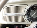 a close up of a car dashboard with a clock on it