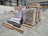 boxes and pallets are stacked on pallets in a warehouse