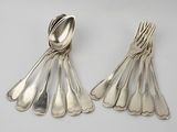 silver plated spoons and spoons on a white surface