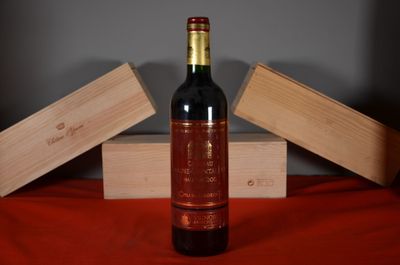 a bottle of wine that is sitting on a table