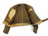 an image of a brown hat with a leather patch