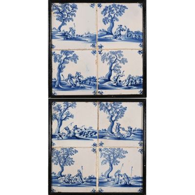 un ensemble de quatre panneaux de carrelage bleus et blancs représentant un paysage
