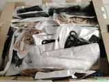 a cardboard box filled with lots of different types of shoes