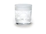 a glass cup with a design on it on a white surface