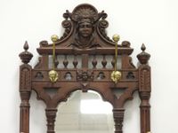 VESTIAIRE en bois mouluré et sculpté à décor ajouré de dauph… (photo 5)