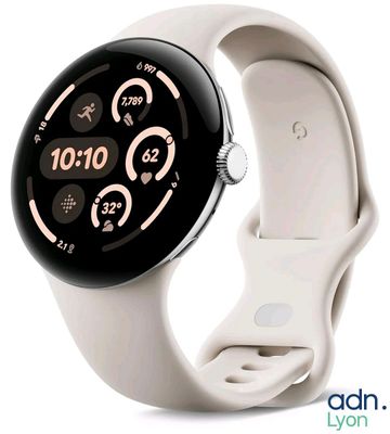 a close up of a smart watch on a white surface