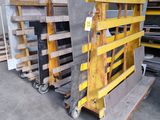 many pallets of wood and metal in a warehouse