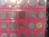 a picture of a display case with a variety of coins