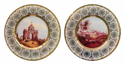 deux assiettes sur lesquelles est représentée une église