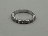 an image of a diamond ring on a table