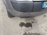 a car that is parked on the side of the street