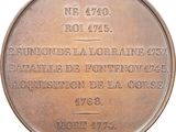 an image of a bronze medal with the name of a man on it