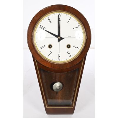 an old wooden clock with roman numerals on a white background