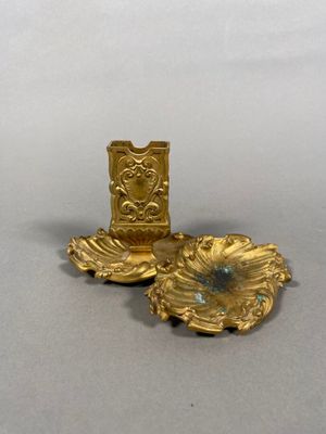 a gold object that is sitting on a table