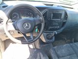 a car dashboard with a steering wheel and a dash board