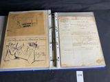 an old book with a drawing on it on a table