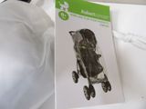 a picture of a baby stroller and a bag on a table