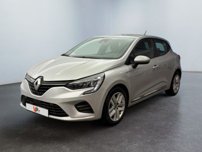 a silver car is parked in a room with a black floor