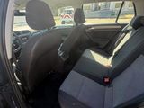 the back seats of a car are empty in the parking lot