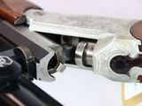 a close up of a rifle with a gun in it