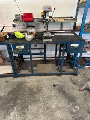 an image of a workbench with tools on it