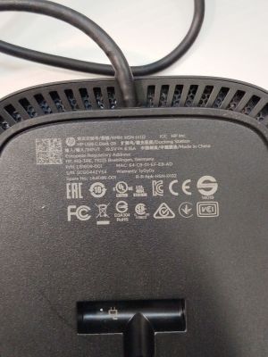 a close up of a black power cord connected to a computer mouse