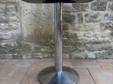 an image of a table with a glass on it