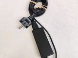 a close up of a charger plugged in to a wall charger